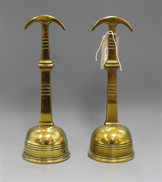 A pair of 19th century brass doorstops
